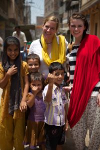 Illustrator Sophie Blackall and her daughter Olive with children vaccinated against measles near Varanasi, India.