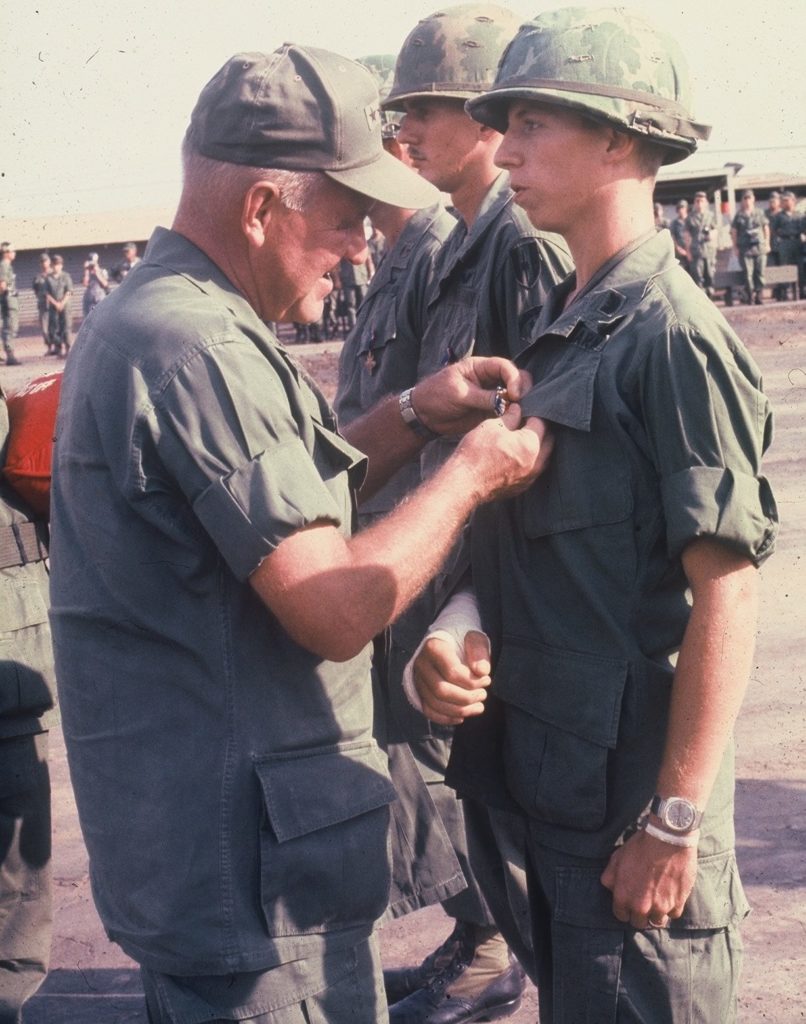 General Creighton Abrams Pins Silver Star on Steve in Vietnam.