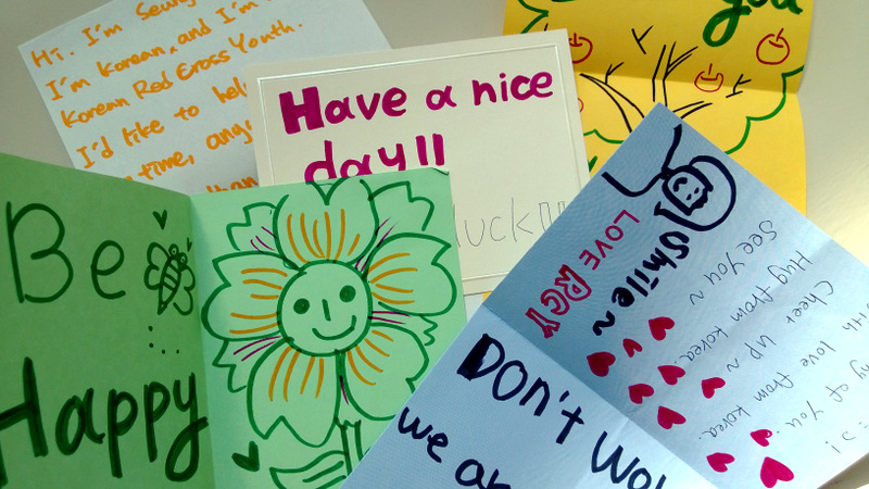 The visiting Korean Red Cross youth group made cards for youth in the U.S. that had experienced disasters