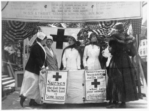 World War I nurses work at a recruiting station to field new members.