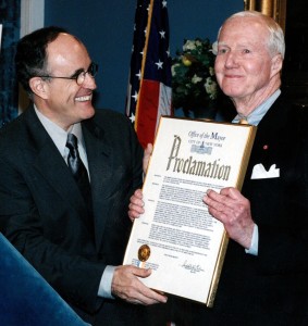 Mayor Rudy Giuliani presents New York Red Cross chairman Jonathan O’Herron with a proclamation in 2000.