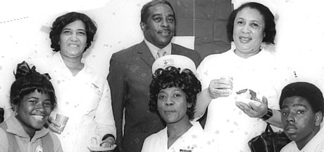 This 1971 photograph shows Harlem Service Center staff members. 