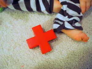 infant preparedness baby feet with red cross