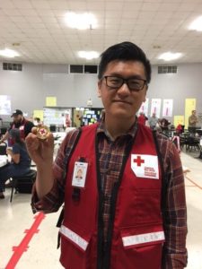 Canadian Red Cross helping Hurricane Matthew Angelo with challenge coin