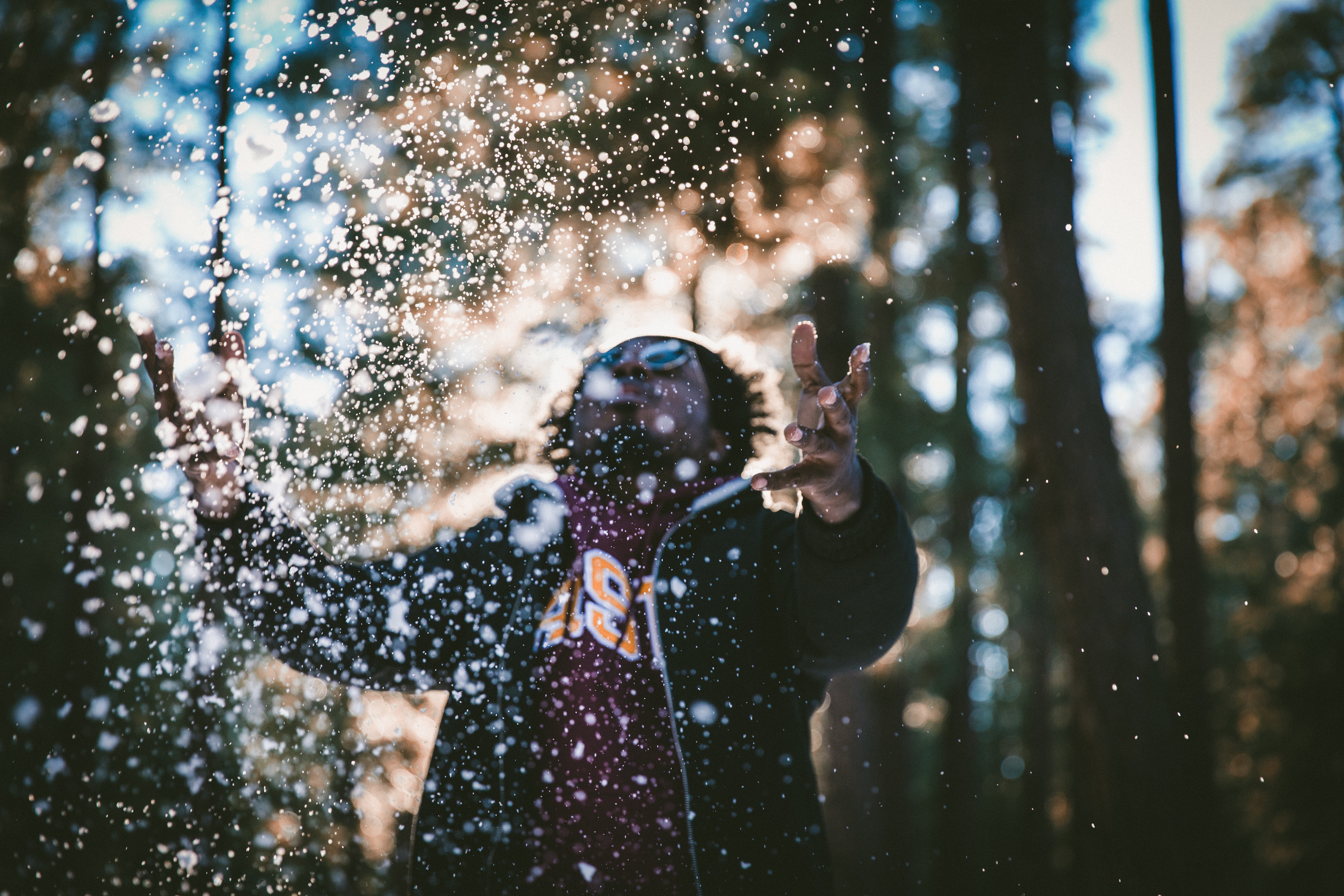 Man throwing snow