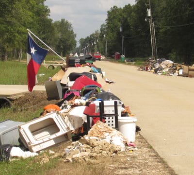 Home items destroyed by Hurricane Harvey piled by curbside