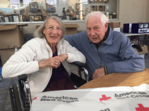Jack and Esme Griffiths Sit at Red Cross Shelter