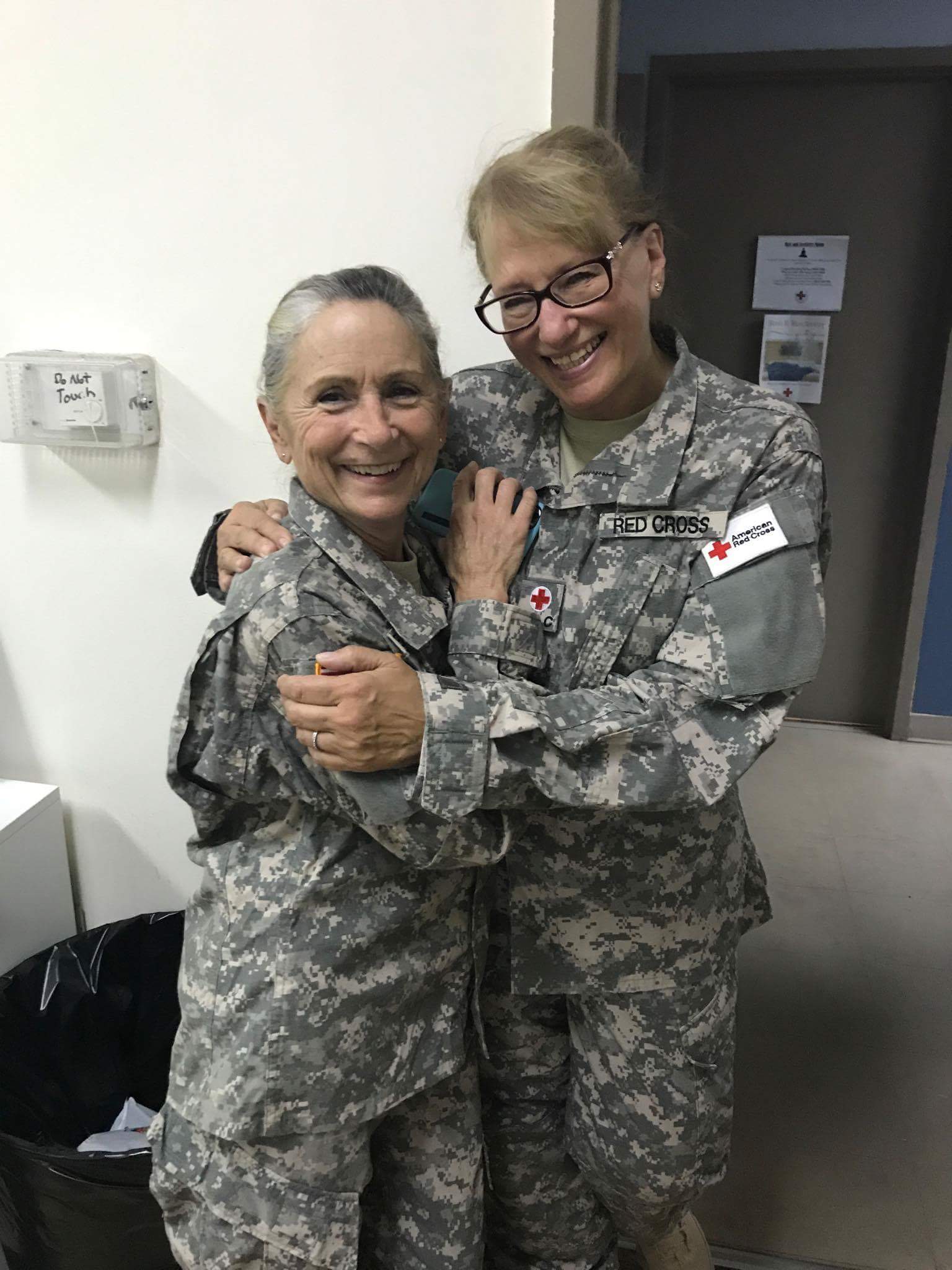 Phyllis hugging her friend and volunteer, Cheryl Searcy. 