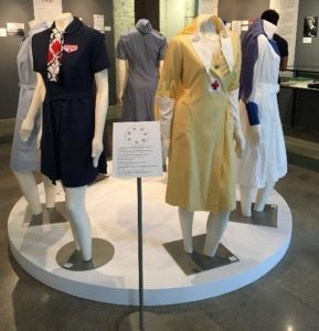 Women's Red Cross uniforms displayed in the Coral Gables Museum exhibit in South Florida.