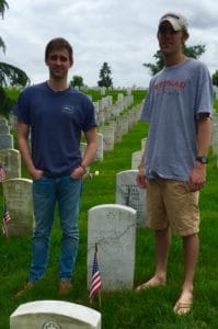 Elizabeth's two sons Russell and Will at her father's memorial at Arlington National Cemetery for Memorial Day.