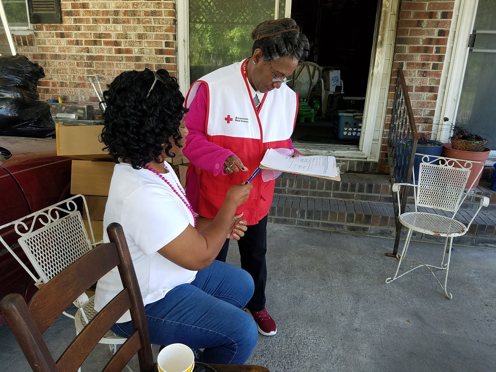Janette with a Red Cross volunteer. 