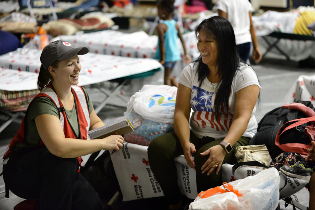 Claudia speaking to a Red Cross volunteer in a shelter in North Carolina. 