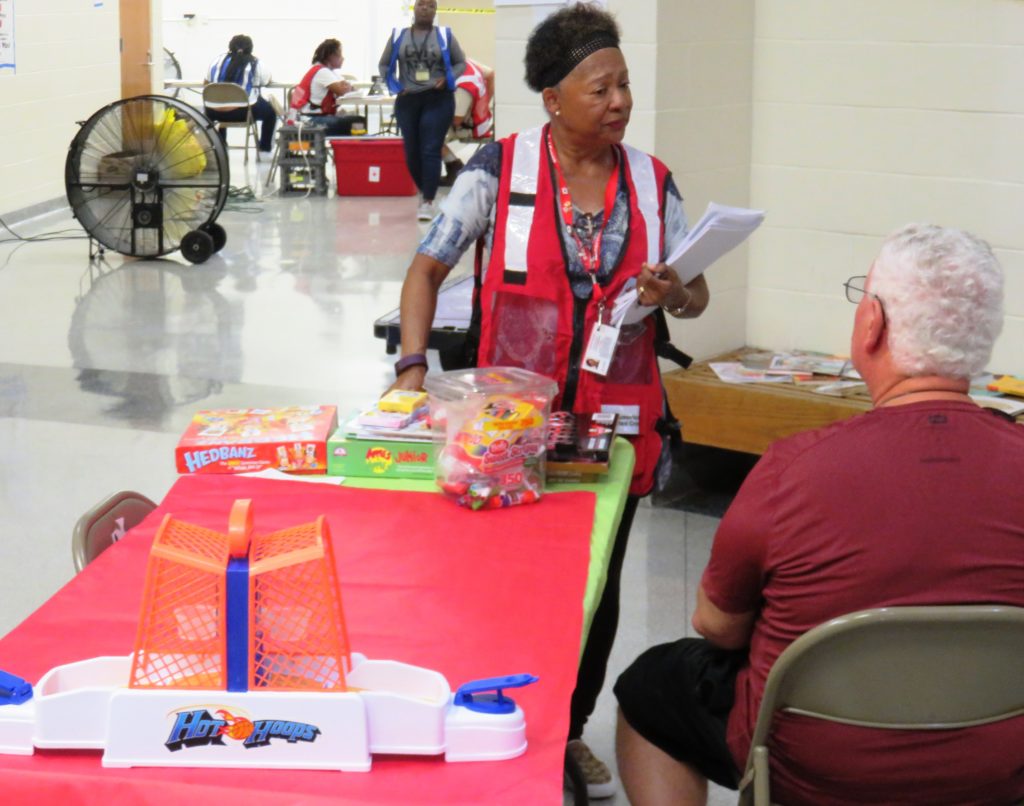 Lydia Willingham speaking to a fellow Red Cross volunteer at a shelter in Columbia, South Carolina.