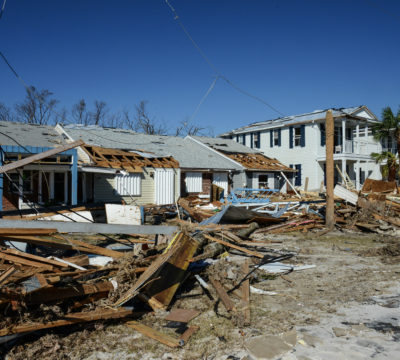 A photo of a damaged home after a hurricane.