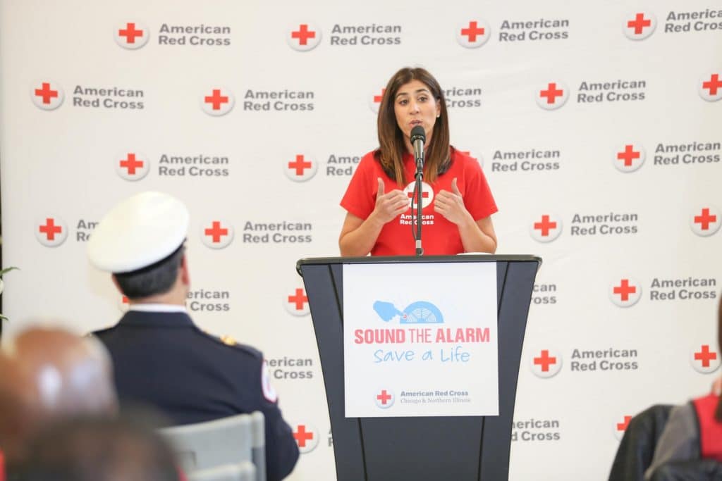 Celena speaking at a Red Cross Sound the Alarm event.