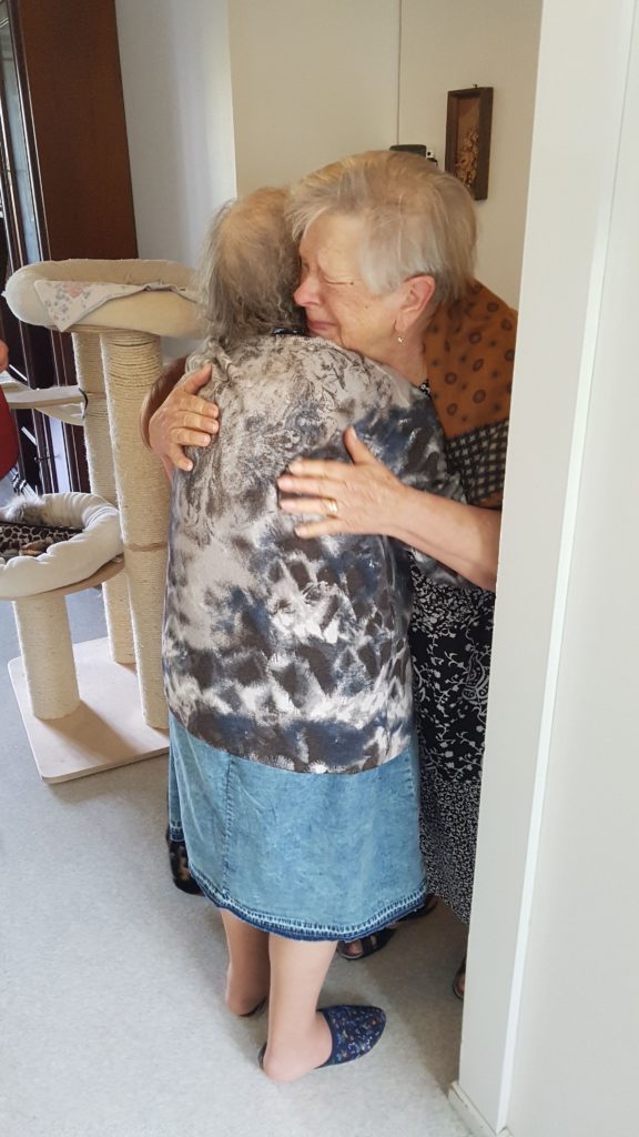 After a separation that lasted more than 70 years, Tamara (right) and her sister, Lidia, embrace during their reunion in Finland. 