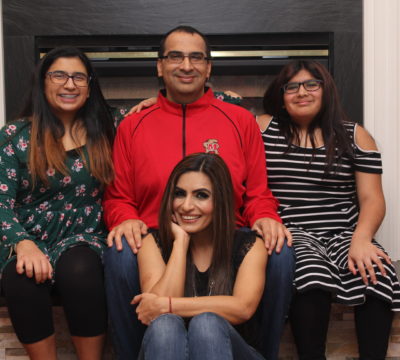 A family photo of Vikas, his wife and two daughters.