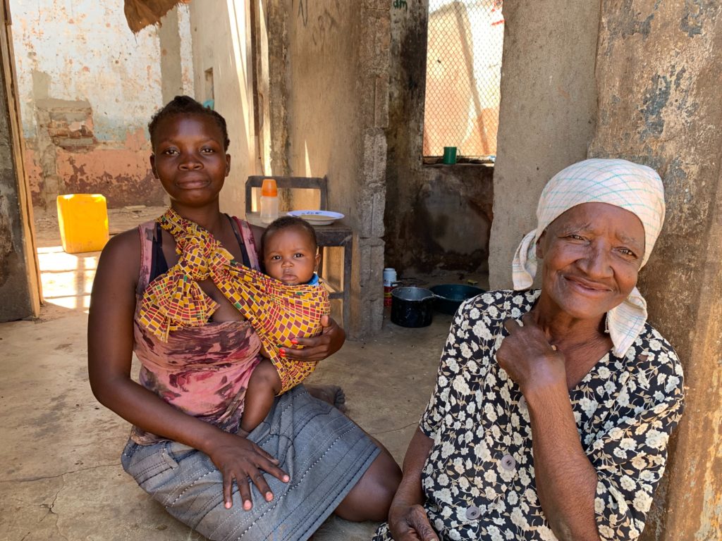 Maria Luisa was carried through neck high water with the help of a neighbor the night Cyclone Idai hit. She is still unable to walk, but takes comfort in her daughter and granddaughter staying with her in Buzi, Mozambique. 