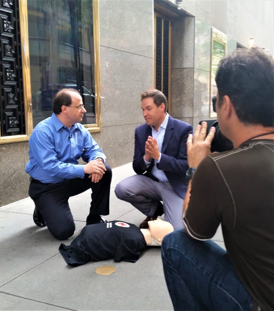 Dr. Markenson showing the Today Show how to perform CPR. 