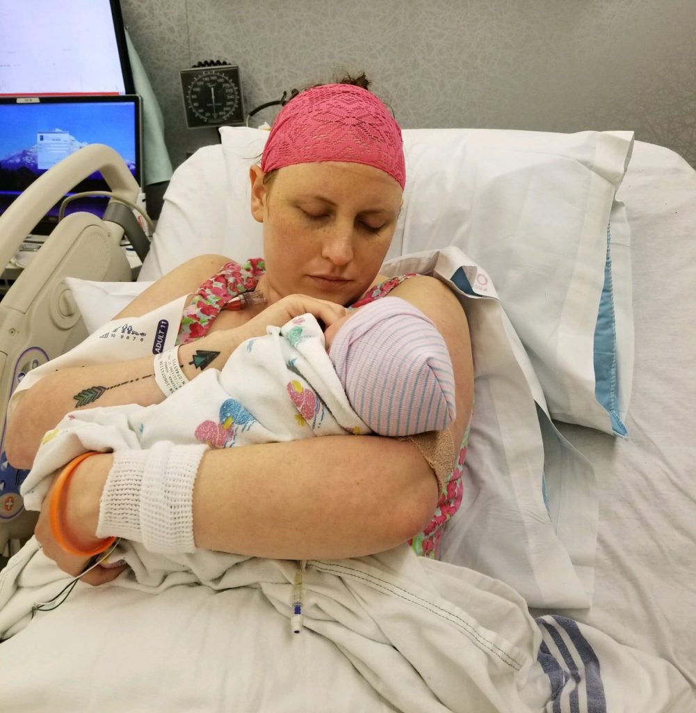 Hannah and baby Jenson in the hospital. 