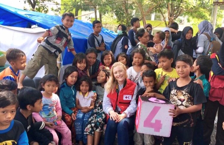 Sydney with children in Lombok, Indonesia.