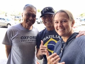 Christine standing with Frank and Mark.