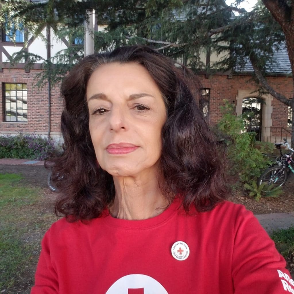 Christine Medeiros in a Red Cross shirt.